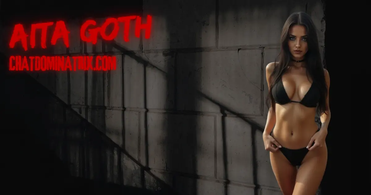 Mistress Aita Goth. A dominant woman in black lingerie and a choker-style BDSM collar stands confidently against a dark industrial background. Her piercing gaze and controlled posture exude power, authority, and ownership, key themes in collar symbolism. BDSM collars represent submission, devotion, and the depth of a power exchange relationship, ranging from casual fashion statements to formal ownership contracts.