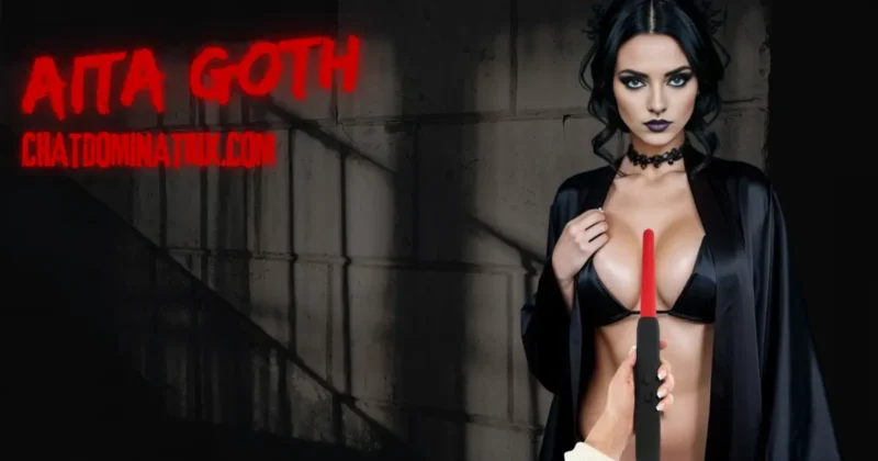 Aita Goth - dominatrix with intense gaze, ready to experience the electrifying thrill of the Electro Zapper 2.0 in BDSM play