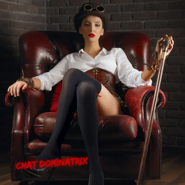 Steampunk-inspired dominant woman seated in a leather chair, symbolizing authority and control in CFNM role-play