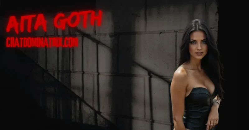 Mistress Aita Goth. Elegant dominatrix in black strapless lingerie stands confidently against a shadowed, industrial backdrop, exuding power, sensuality, and control, an embodiment of femme dominance. Her piercing gaze and sleek, form-fitting attire make her the ultimate visual for BDSM lingerie empowerment.