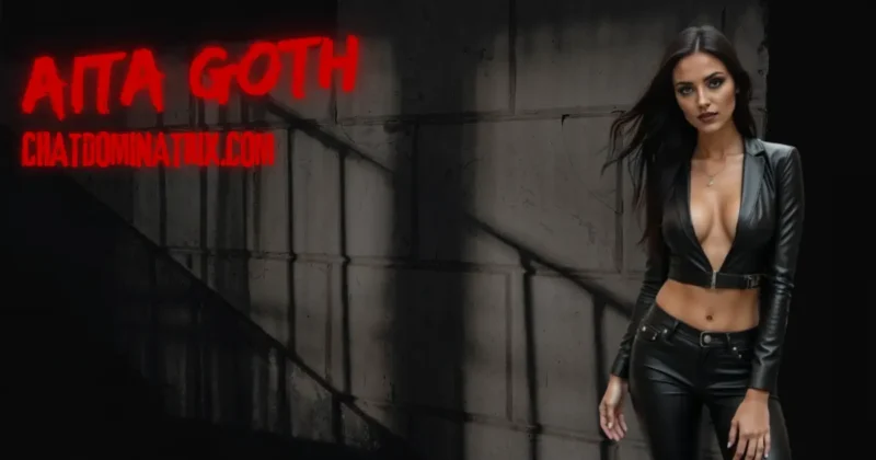 Aita Goth in black leather dominatrix attire, standing in shadow against a dungeon wall, neon red text reading ‘AITA GOTH’ and ‘chatdominatrix.com’ glows above her. A seductive visual for the ultimate Femdom guide to strap-on training, pegging dominance, and erotic power exchange