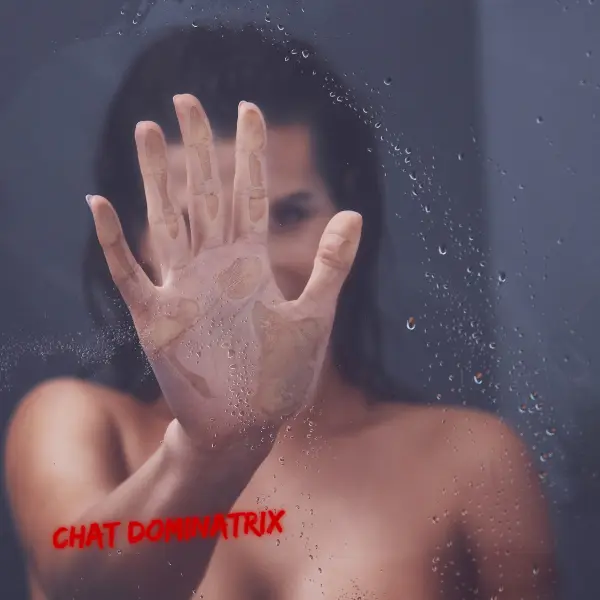 A submissive woman glass room public humiliation in BDSM
